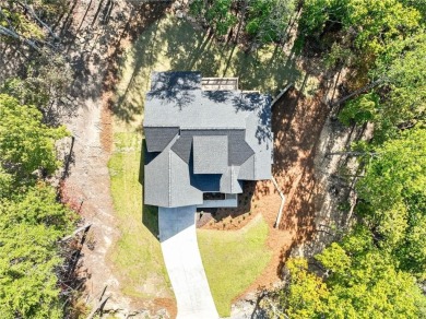 This stunning new construction blends luxury, functionality, and on The Highlands Course at Lake Arrowhead in Georgia - for sale on GolfHomes.com, golf home, golf lot