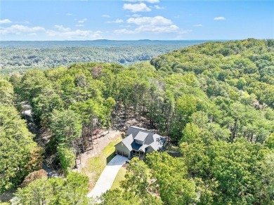 This stunning new construction blends luxury, functionality, and on The Highlands Course at Lake Arrowhead in Georgia - for sale on GolfHomes.com, golf home, golf lot