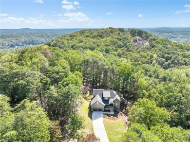This stunning new construction blends luxury, functionality, and on The Highlands Course at Lake Arrowhead in Georgia - for sale on GolfHomes.com, golf home, golf lot