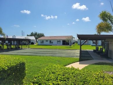 Welcome to Mainlands, an active 55+ golf cart-friendly community on Mainlands Golf Club in Florida - for sale on GolfHomes.com, golf home, golf lot