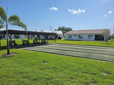 Welcome to Mainlands, an active 55+ golf cart-friendly community on Mainlands Golf Club in Florida - for sale on GolfHomes.com, golf home, golf lot