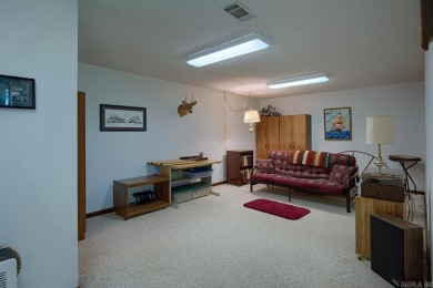 A SERENE RETREAT!  Meticulously landscaped, this tastefully on Cortez Golf Course in Arkansas - for sale on GolfHomes.com, golf home, golf lot