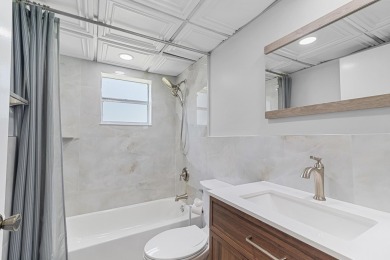 Sophisticated Corner Unit in Kings Point - Fully Renovated & on Kings Point Golf -Flanders Way in Florida - for sale on GolfHomes.com, golf home, golf lot