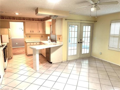 Discover this charming 3-bedroom, 2-bathroom (2 car garage) home on Lakewood Country Club in Florida - for sale on GolfHomes.com, golf home, golf lot