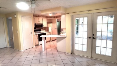 Discover this charming 3-bedroom, 2-bathroom (2 car garage) home on Lakewood Country Club in Florida - for sale on GolfHomes.com, golf home, golf lot