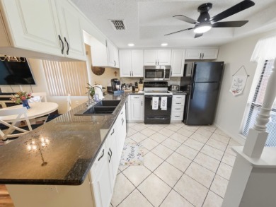 Now available in the desirable 55+ community of Glenwood Village on Beacon Woods Golf Club in Florida - for sale on GolfHomes.com, golf home, golf lot