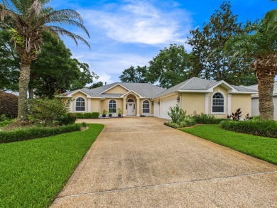 Situated on an oversized lot and a half, this beautifully on Fairway Oaks at Magnolia Golf Course in Florida - for sale on GolfHomes.com, golf home, golf lot
