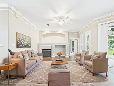 Situated on an oversized lot and a half, this beautifully on Fairway Oaks at Magnolia Golf Course in Florida - for sale on GolfHomes.com, golf home, golf lot