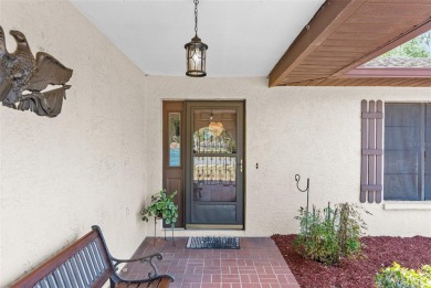 Welcome home to this charming and METICULOUSLY maintained on Oak Hills Country Club in Florida - for sale on GolfHomes.com, golf home, golf lot