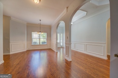 Perfect ranch home in popular Covington Place overlooking the on Indian Creek Golf Club in Georgia - for sale on GolfHomes.com, golf home, golf lot