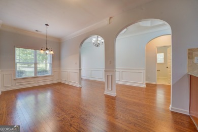 Perfect ranch home in popular Covington Place overlooking the on Indian Creek Golf Club in Georgia - for sale on GolfHomes.com, golf home, golf lot