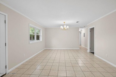 Welcome home this charming Fort Bayou Estates rancher with on Gulf Hills Golf Club in Mississippi - for sale on GolfHomes.com, golf home, golf lot