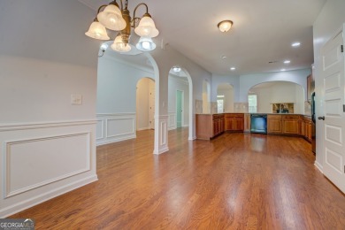 Perfect ranch home in popular Covington Place overlooking the on Indian Creek Golf Club in Georgia - for sale on GolfHomes.com, golf home, golf lot