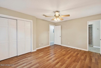 Welcome home this charming Fort Bayou Estates rancher with on Gulf Hills Golf Club in Mississippi - for sale on GolfHomes.com, golf home, golf lot