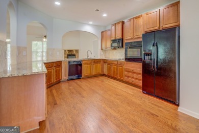 Perfect ranch home in popular Covington Place overlooking the on Indian Creek Golf Club in Georgia - for sale on GolfHomes.com, golf home, golf lot