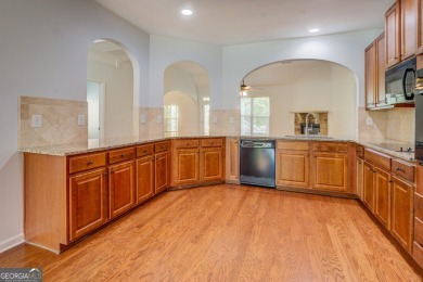 Perfect ranch home in popular Covington Place overlooking the on Indian Creek Golf Club in Georgia - for sale on GolfHomes.com, golf home, golf lot