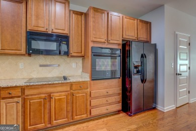 Perfect ranch home in popular Covington Place overlooking the on Indian Creek Golf Club in Georgia - for sale on GolfHomes.com, golf home, golf lot