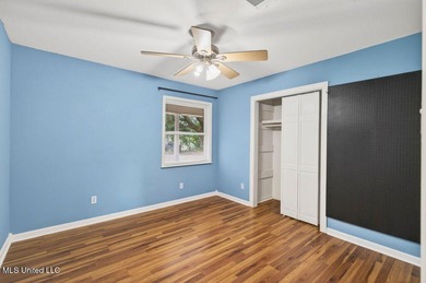 Welcome home this charming Fort Bayou Estates rancher with on Gulf Hills Golf Club in Mississippi - for sale on GolfHomes.com, golf home, golf lot