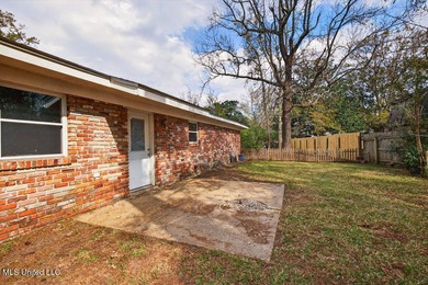 Welcome home this charming Fort Bayou Estates rancher with on Gulf Hills Golf Club in Mississippi - for sale on GolfHomes.com, golf home, golf lot