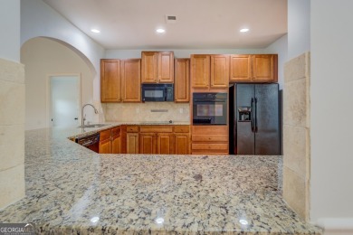 Perfect ranch home in popular Covington Place overlooking the on Indian Creek Golf Club in Georgia - for sale on GolfHomes.com, golf home, golf lot