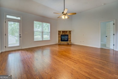 Perfect ranch home in popular Covington Place overlooking the on Indian Creek Golf Club in Georgia - for sale on GolfHomes.com, golf home, golf lot
