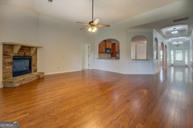 Perfect ranch home in popular Covington Place overlooking the on Indian Creek Golf Club in Georgia - for sale on GolfHomes.com, golf home, golf lot