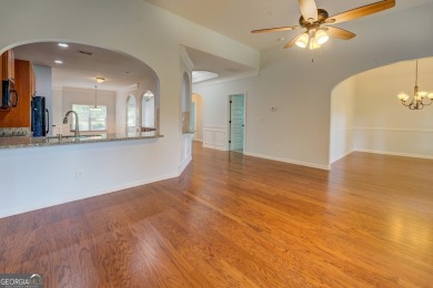 Perfect ranch home in popular Covington Place overlooking the on Indian Creek Golf Club in Georgia - for sale on GolfHomes.com, golf home, golf lot