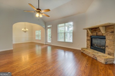 Perfect ranch home in popular Covington Place overlooking the on Indian Creek Golf Club in Georgia - for sale on GolfHomes.com, golf home, golf lot