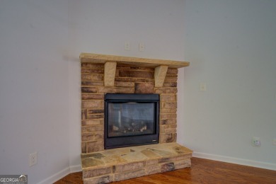Perfect ranch home in popular Covington Place overlooking the on Indian Creek Golf Club in Georgia - for sale on GolfHomes.com, golf home, golf lot