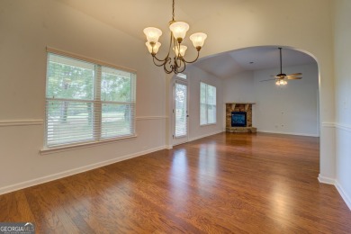 Perfect ranch home in popular Covington Place overlooking the on Indian Creek Golf Club in Georgia - for sale on GolfHomes.com, golf home, golf lot