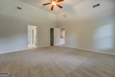 Perfect ranch home in popular Covington Place overlooking the on Indian Creek Golf Club in Georgia - for sale on GolfHomes.com, golf home, golf lot