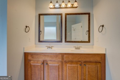 Perfect ranch home in popular Covington Place overlooking the on Indian Creek Golf Club in Georgia - for sale on GolfHomes.com, golf home, golf lot
