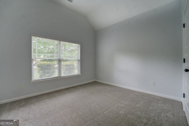 Perfect ranch home in popular Covington Place overlooking the on Indian Creek Golf Club in Georgia - for sale on GolfHomes.com, golf home, golf lot