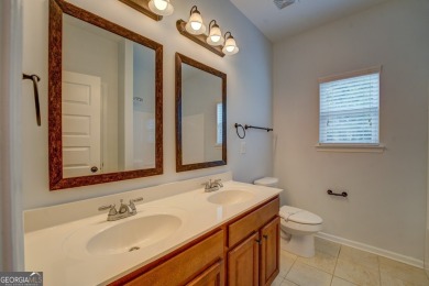 Perfect ranch home in popular Covington Place overlooking the on Indian Creek Golf Club in Georgia - for sale on GolfHomes.com, golf home, golf lot
