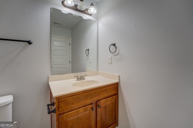 Perfect ranch home in popular Covington Place overlooking the on Indian Creek Golf Club in Georgia - for sale on GolfHomes.com, golf home, golf lot