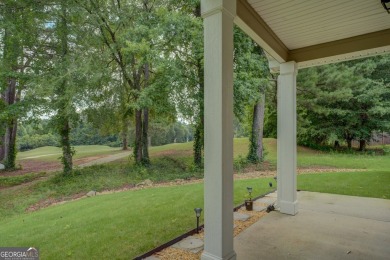 Perfect ranch home in popular Covington Place overlooking the on Indian Creek Golf Club in Georgia - for sale on GolfHomes.com, golf home, golf lot