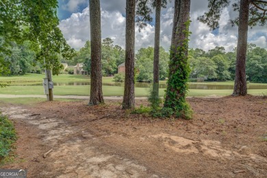 Perfect ranch home in popular Covington Place overlooking the on Indian Creek Golf Club in Georgia - for sale on GolfHomes.com, golf home, golf lot