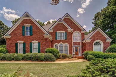 Welcome home to this 3-sided brick home with owners suite on the on Canongate At Eagle Watch Golf Club in Georgia - for sale on GolfHomes.com, golf home, golf lot