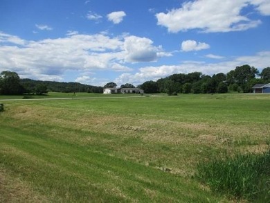 This lot is just under a half-acre with 20,909 SqFt, all on Reedsburg Country Club in Wisconsin - for sale on GolfHomes.com, golf home, golf lot