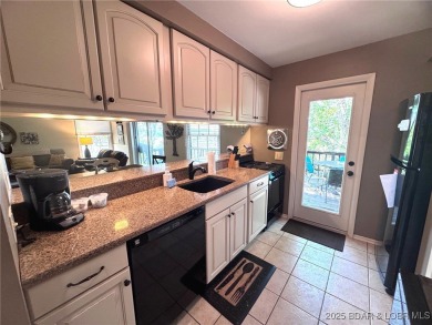 The 2 bed/2bath home with lake view is just what you are looking on The Oaks Golf Course in Missouri - for sale on GolfHomes.com, golf home, golf lot