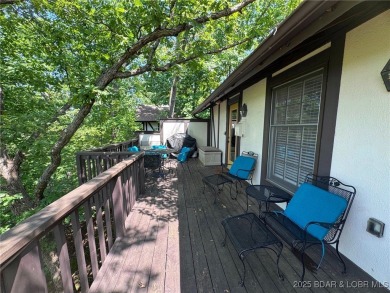The 2 bed/2bath home with lake view is just what you are looking on The Oaks Golf Course in Missouri - for sale on GolfHomes.com, golf home, golf lot