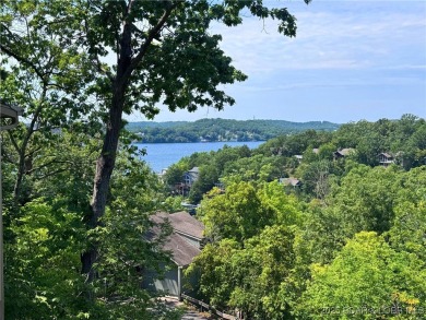 The 2 bed/2bath home with lake view is just what you are looking on The Oaks Golf Course in Missouri - for sale on GolfHomes.com, golf home, golf lot
