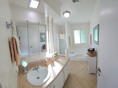 This move-in ready, fully furnished 2-bedroom, 2-bathroom on Palm Desert Greens Country Club in California - for sale on GolfHomes.com, golf home, golf lot