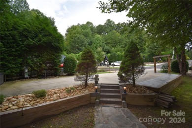 MOTIVATED SELLER, WILL CONSIDER ALL OFFERS! Looking for a place on Rumbling Bald Resort on Lake Lure in North Carolina - for sale on GolfHomes.com, golf home, golf lot