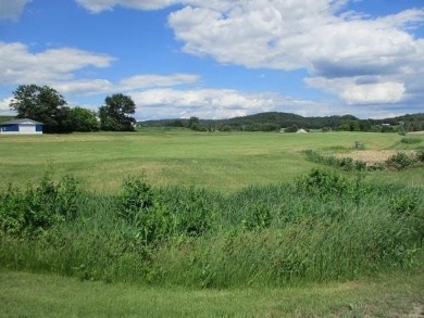 Corner lot with great views, this lot is just under a half-acre on Reedsburg Country Club in Wisconsin - for sale on GolfHomes.com, golf home, golf lot