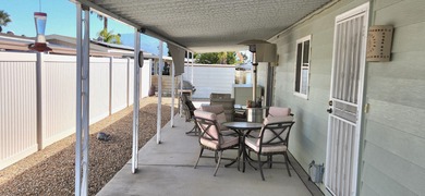 This move-in ready, fully furnished 2-bedroom, 2-bathroom on Palm Desert Greens Country Club in California - for sale on GolfHomes.com, golf home, golf lot