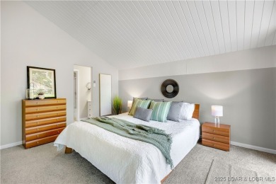 This magnificent 5-bedroom, 3-bathroom lakefront home is walking on The Oaks Golf Course in Missouri - for sale on GolfHomes.com, golf home, golf lot