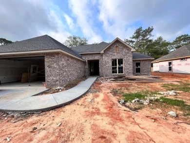 This property is a Beautiful custom 4 bedroom 2 bath New on Millbrook Country Club in Mississippi - for sale on GolfHomes.com, golf home, golf lot