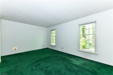 Welcome to a tranquil setting in a well-loved neighborhood! This on Forest Oaks Country Club in North Carolina - for sale on GolfHomes.com, golf home, golf lot