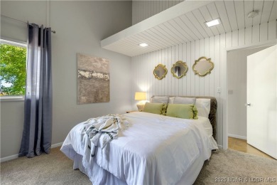This magnificent 5-bedroom, 3-bathroom lakefront home is walking on The Oaks Golf Course in Missouri - for sale on GolfHomes.com, golf home, golf lot